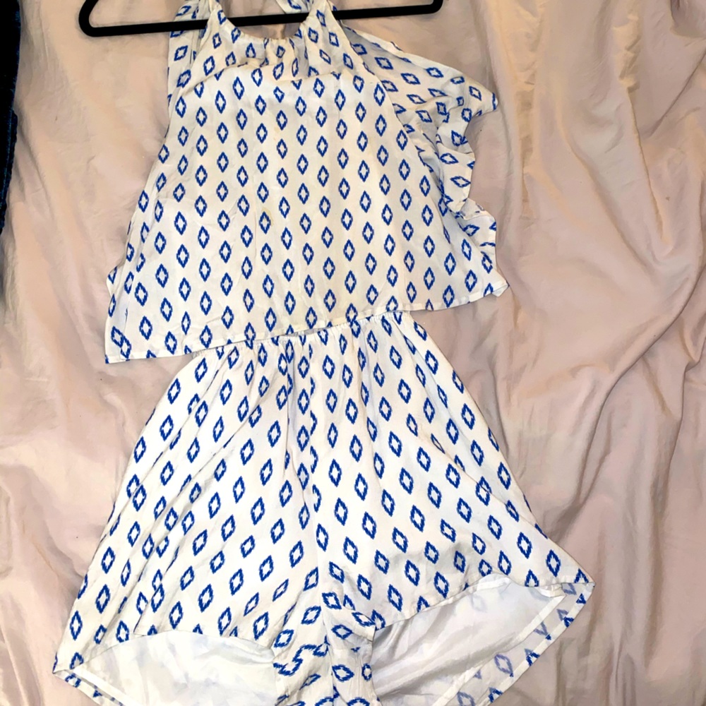 White printed halter top cut out romper jumpsuit